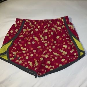 Pink and yellow under armor athletic shorts